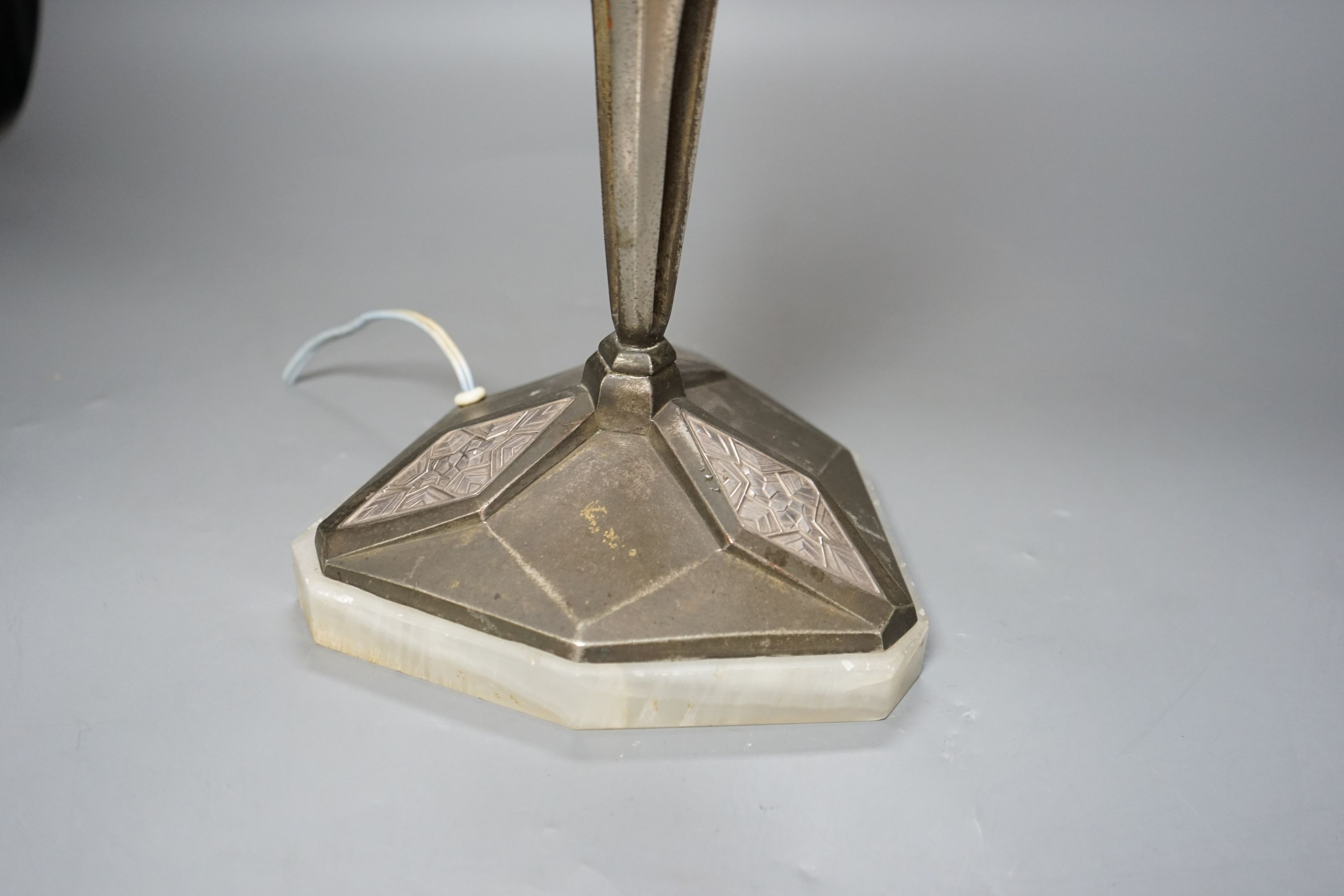 A Secessionist metal table lamp base - indistinctly initialled, 64cms high